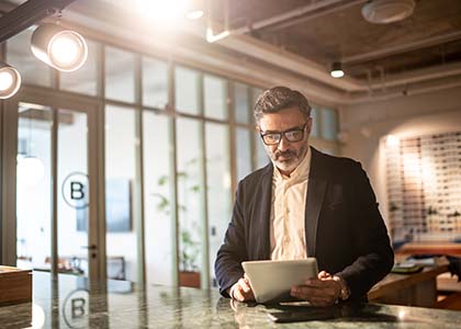 Businessman reading in office